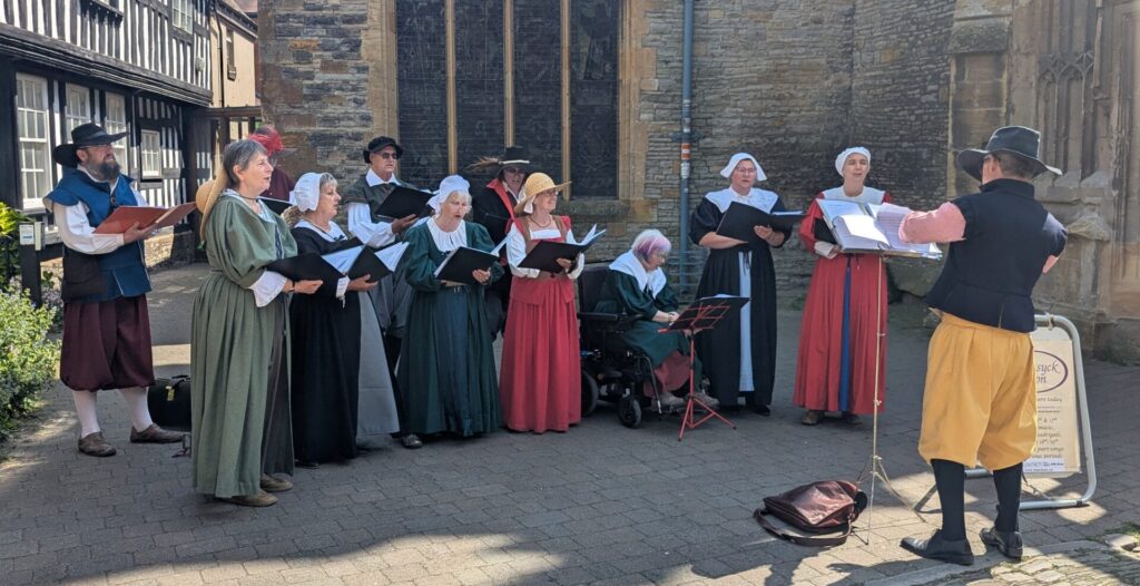 group of singers in medieval costume